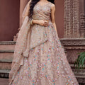 Gorgeous Beige Net Embroidered Wedding Lehenga Choli with Floral Sequins Work