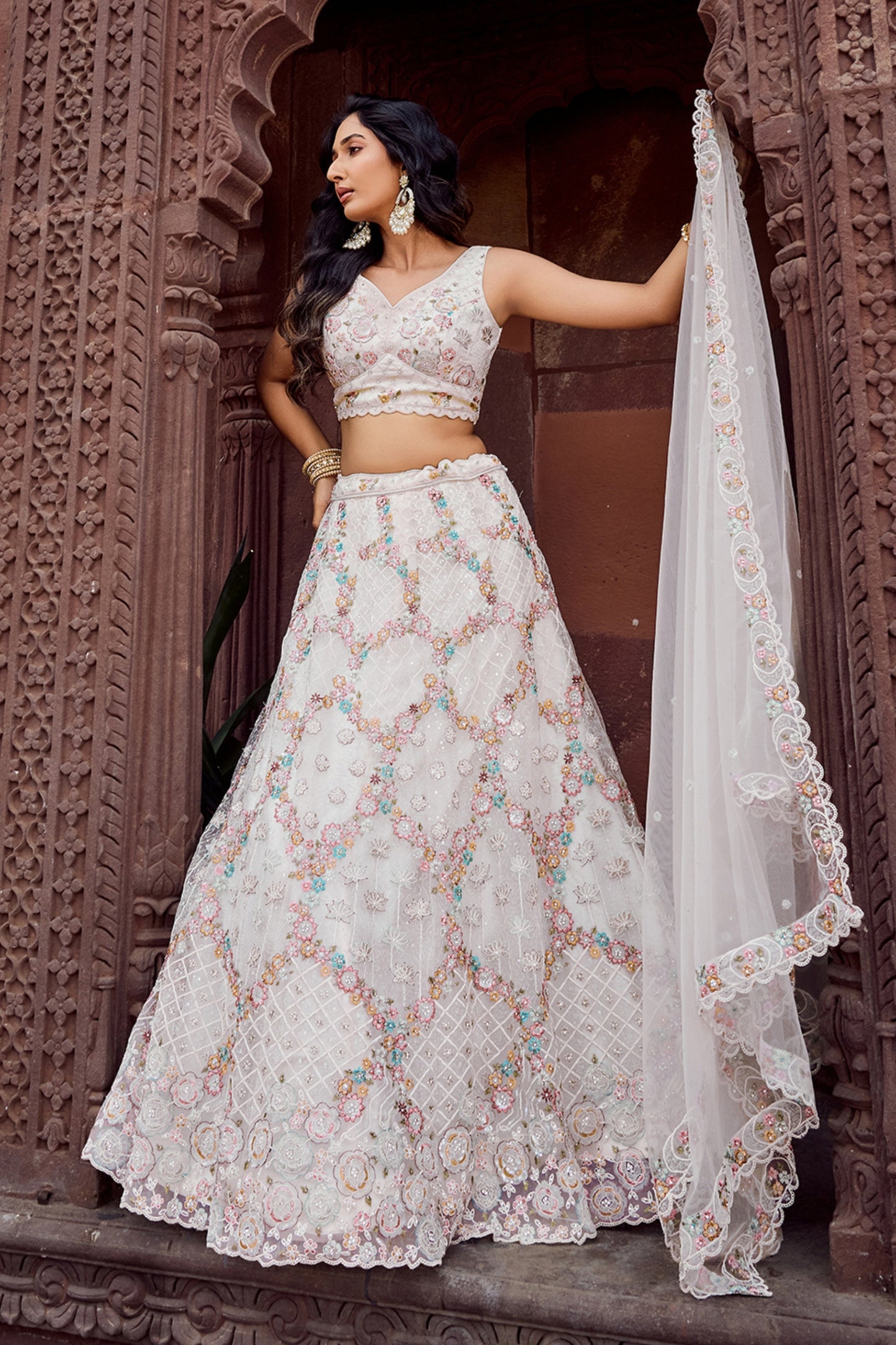 Trendy Cream Net Embroidered Wedding Lehenga Choli with Floral Sequins Work