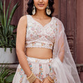 Trendy Cream Net Embroidered Wedding Lehenga Choli with Floral Sequins Work