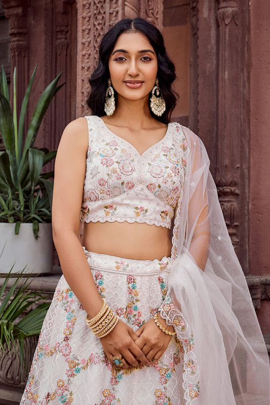 Trendy Cream Net Embroidered Wedding Lehenga Choli with Floral Sequins Work