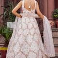 Trendy Cream Net Embroidered Wedding Lehenga Choli with Floral Sequins Work
