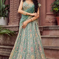 Royal Green Net Embroidered Wedding Lehenga Choli with Heavy Floral Sequins Work