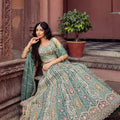 Royal Green Net Embroidered Wedding Lehenga Choli with Heavy Floral Sequins Work