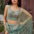 Royal Green Net Embroidered Wedding Lehenga Choli with Heavy Floral Sequins Work