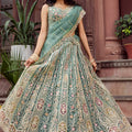 Royal Green Net Embroidered Wedding Lehenga Choli with Heavy Floral Sequins Work