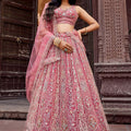 Stunning Pink Net Embroidered Wedding Lehenga Choli with Heavy Floral Sequins Work