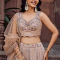 Designer Beige Net Embroidered Wedding Lehenga Choli with Heavy Sequins and Thread Work