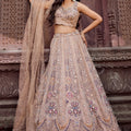 Designer Beige Net Embroidered Wedding Lehenga Choli with Heavy Sequins and Thread Work