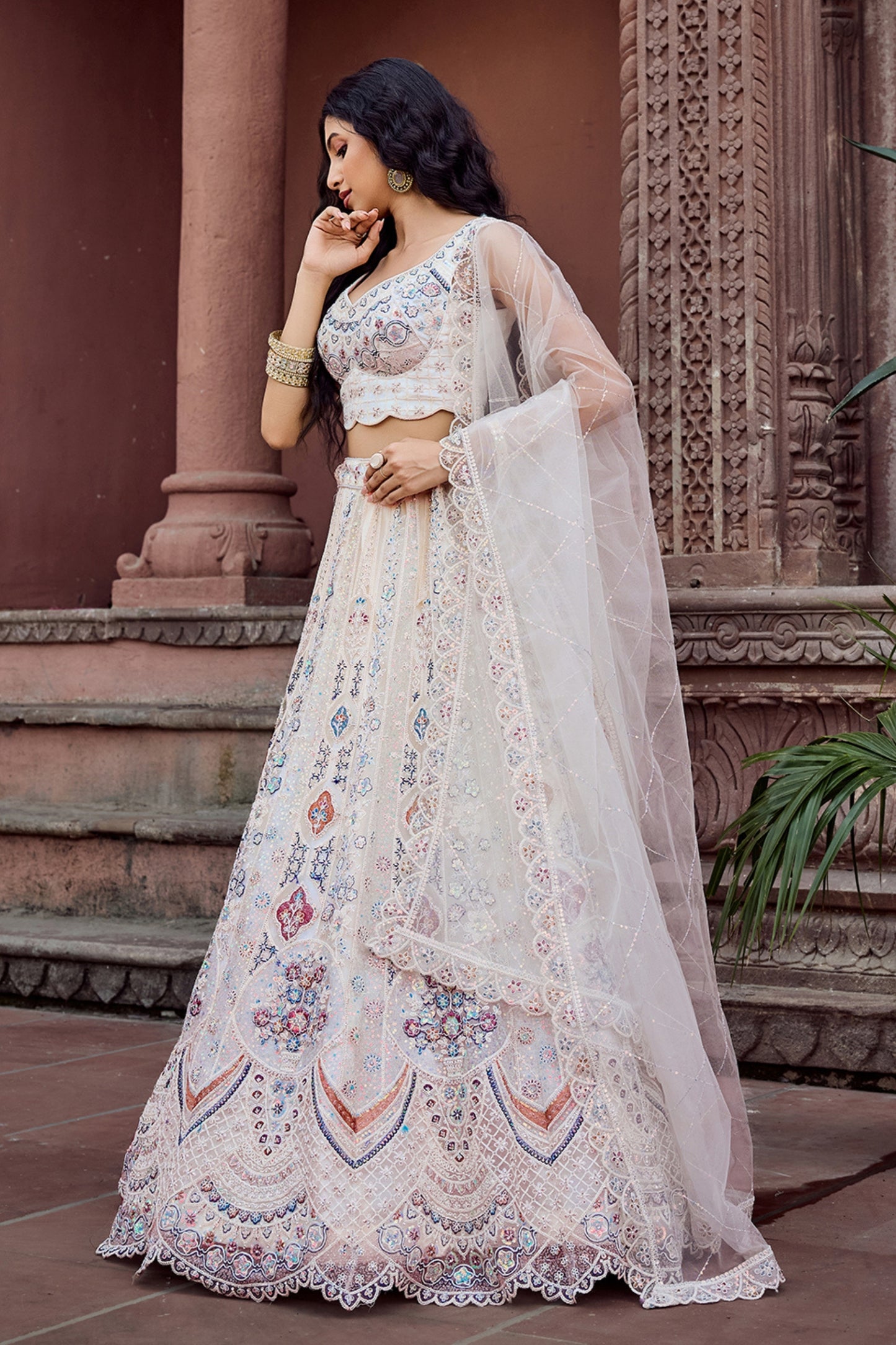 Trendy Cream Net Embroidered Wedding Lehenga Choli with Multicolor Thread and Sequins Work
