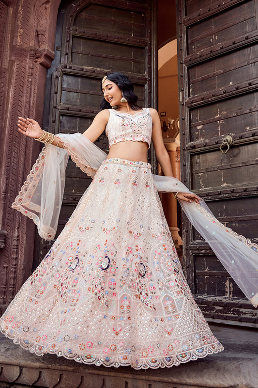 Fancy Cream Net Embroidered Wedding Lehenga Choli with Peacock Motif and Sequins Work