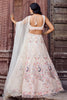 Fancy Cream Net Embroidered Wedding Lehenga Choli with Peacock Motif and Sequins Work