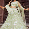 Dashing Lime Green Net Embroidered Wedding Lehenga Choli with Floral Thread and Sequins Work