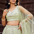 Dashing Lime Green Net Embroidered Wedding Lehenga Choli with Floral Thread and Sequins Work