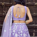 Lovely Lavender Net Embroidered Wedding Lehenga Choli with Floral Thread and Sequins Work