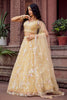 Radiant Yellow Net Embroidered Wedding Lehenga Choli with Floral Thread and Sequins Work