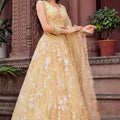 Radiant Yellow Net Embroidered Wedding Lehenga Choli with Floral Thread and Sequins Work