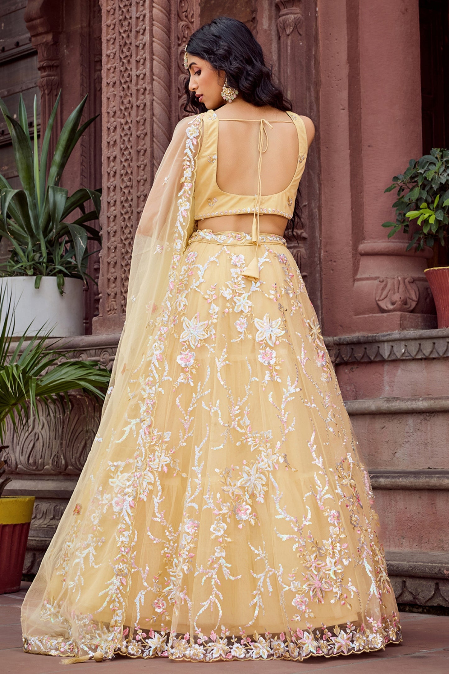 Radiant Yellow Net Embroidered Wedding Lehenga Choli with Floral Thread and Sequins Work