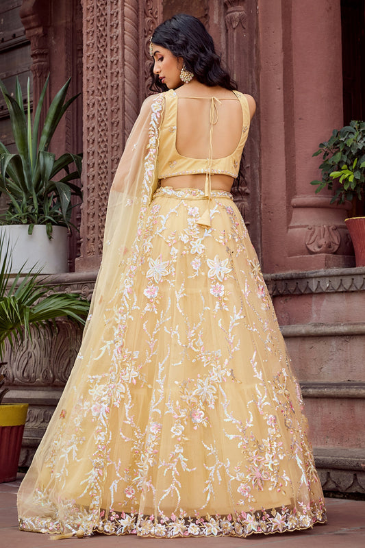 Radiant Yellow Net Embroidered Wedding Lehenga Choli with Floral Thread and Sequins Work