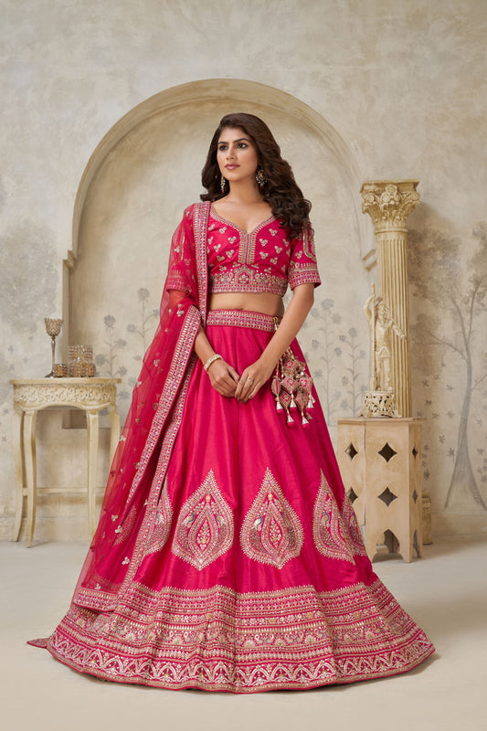 Vibrant Rani Pink Silk Embroidered Lehenga Choli with Matching Dupatta for Wedding
