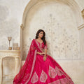 Vibrant Rani Pink Silk Embroidered Lehenga Choli with Matching Dupatta for Wedding