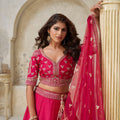 Vibrant Rani Pink Silk Embroidered Lehenga Choli with Matching Dupatta for Wedding