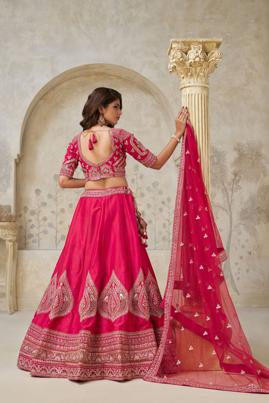 Vibrant Rani Pink Silk Embroidered Lehenga Choli with Matching Dupatta for Wedding