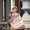 Cream Printed Traditional Saree with Intricate Border