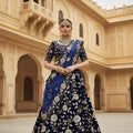 Gorgeous Blue Velvet Embroidered Bridal Lehenga Choli with Heavy Zari Work and Net Dupatta