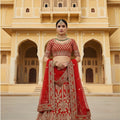 Radiant Red Velvet Embroidered Bridal Lehenga Choli with Heavy Zari Work and Net Dupatta