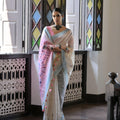 Off-White Handloom Cotton Saree with Pastel Pink Pallu Light Blue Border