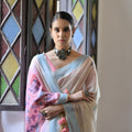 Off-White Handloom Cotton Saree with Pastel Pink Pallu Light Blue Border