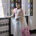 Off-White Handloom Cotton Saree with Pastel Pink Pallu Light Blue Border