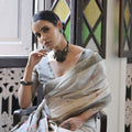 Off-White Handloom Cotton Saree with Tribal Art Print Grey Border