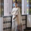 Off-White Handloom Cotton Saree with Tribal Art Print Grey Border