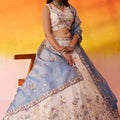 Elegant Beige Floral Embroidered Tissue Lehenga Choli with Blue Dupatta for Wedding