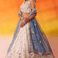 Elegant Beige Floral Embroidered Tissue Lehenga Choli with Blue Dupatta for Wedding