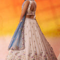 Elegant Beige Floral Embroidered Tissue Lehenga Choli with Blue Dupatta for Wedding