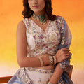 Elegant Beige Floral Embroidered Tissue Lehenga Choli with Blue Dupatta for Wedding