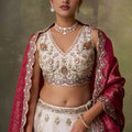 Stunning Beige Embroidered Tissue Lehenga Choli with Maroon Dupatta for Wedding
