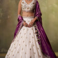 Stylish Beige Embroidered Tissue Lehenga Choli with Purple Dupatta for Wedding