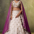 Stylish Beige Embroidered Tissue Lehenga Choli with Purple Dupatta for Wedding