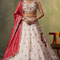 Fancy Beige Embroidered Tissue Lehenga Choli with Red Dupatta for Wedding
