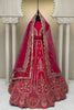 Vibrant Rani Pink Embroidered Silk Bridal Lehenga Choli with Net Dupatta