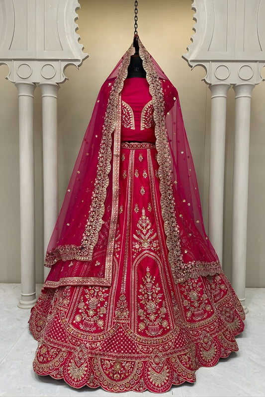 Vibrant Rani Pink Embroidered Silk Bridal Lehenga Choli with Net Dupatta
