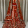 Elegant Rust Orange Embroidered Silk Bridal Lehenga Choli with Net Dupatta