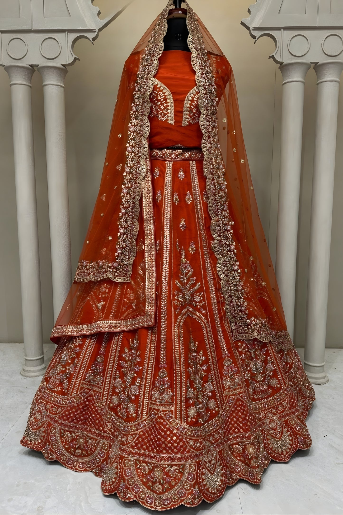 Elegant Rust Orange Embroidered Silk Bridal Lehenga Choli with Net Dupatta