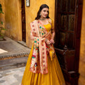 Graceful Yellow Paithani Silk Lehenga Choli with Multicolor Floral Dupatta