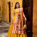Graceful Yellow Paithani Silk Lehenga Choli with Multicolor Floral Dupatta