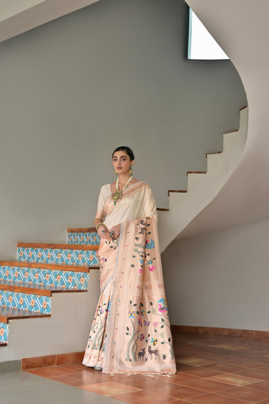Pastel Peach Handwoven Silk Saree with Folk Art Motifs Floral Border