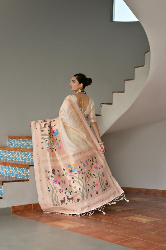 Pastel Peach Handwoven Silk Saree with Folk Art Motifs Floral Border